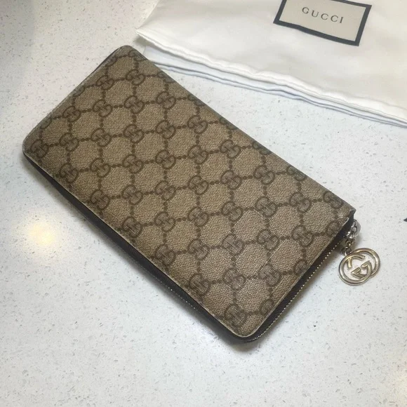 Gucci Brown Monogram Zip Wallet - Picture 1 of 14